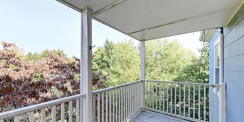 17 Ashley Street, Unit 3 Boston, MA 02130 - Photo 7 of 9 a view of a balcony with wooden floor