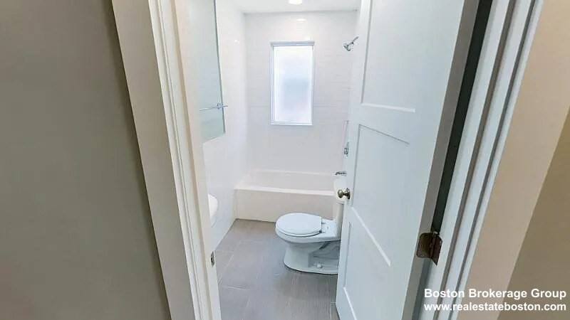 17 Ashley Street, Unit 3 Boston, MA 02130 - Photo 8 of 9 a bathroom with a sink and a toilet
