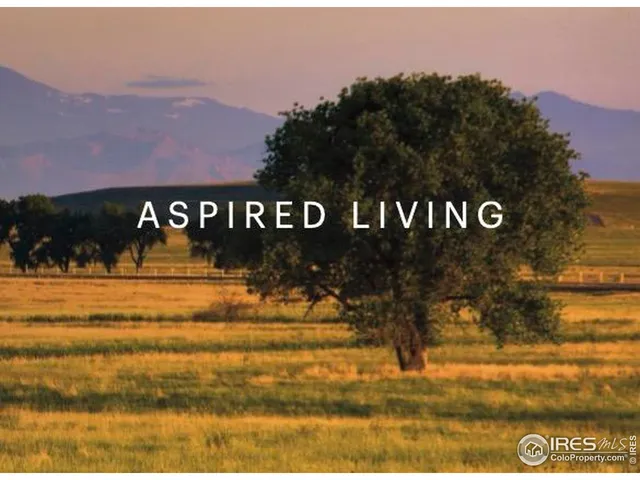 a view of swimming pool with a yard and mountain view