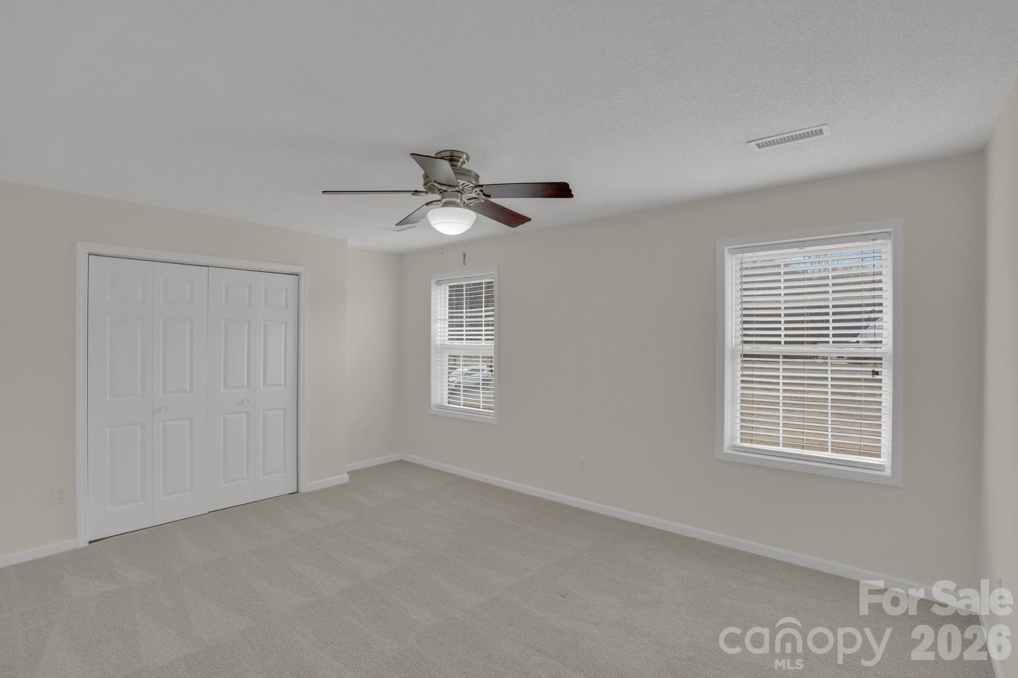 10425 Idlewild Road Matthews, NC 28105 - Photo 13 of 25 a view of an empty room with a window