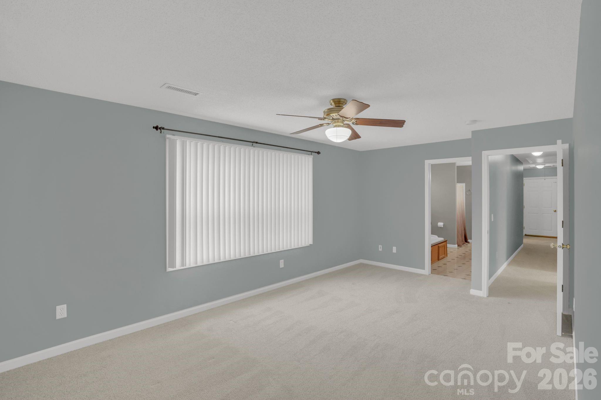10425 Idlewild Road Matthews, NC 28105 - Photo 15 of 25 a view of an empty room with a window