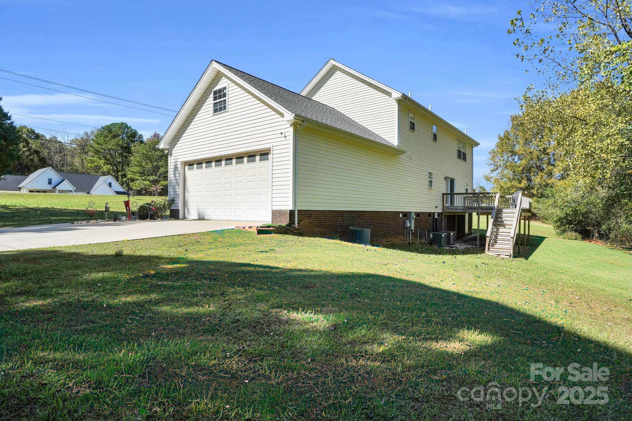 10425 Idlewild Road Matthews, NC 28105 - Photo 17 of 23 a view of a house with a swimming pool