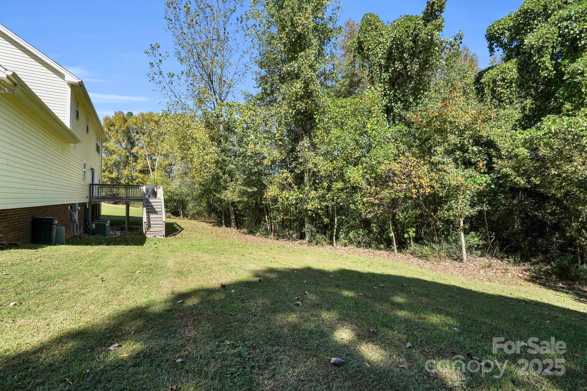 10425 Idlewild Road Matthews, NC 28105 - Photo 18 of 23 a view of swimming pool with a yard