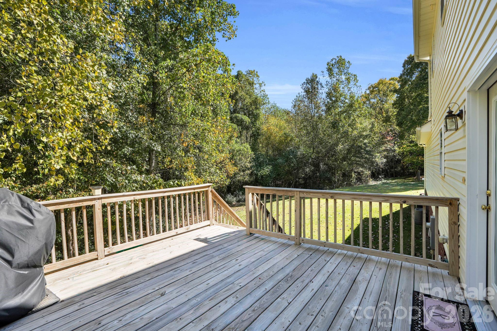 10425 Idlewild Road Matthews, NC 28105 - Photo 18 of 25 a view of deck with wooden floor and fence