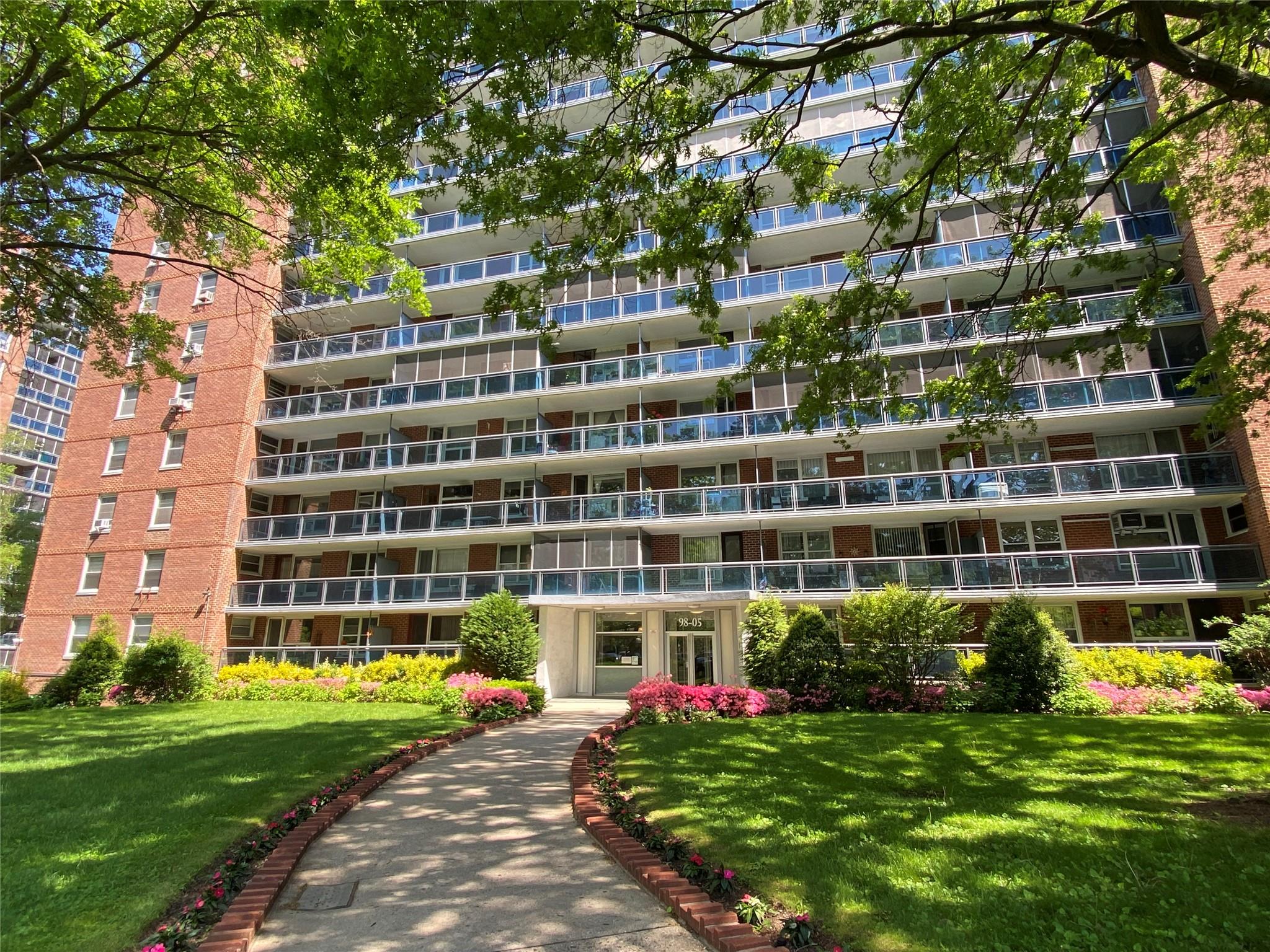 98-05 63rd Road, Unit 15D Queens, NY 11374 - Photo 1 of 1 View of apartment building / complex