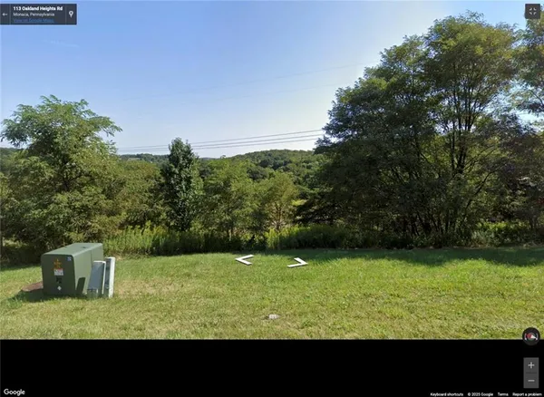a view of an outdoor space and a yard