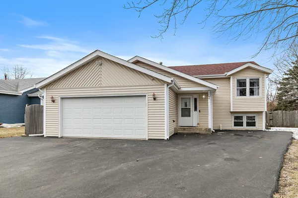 a view of a house with a garage