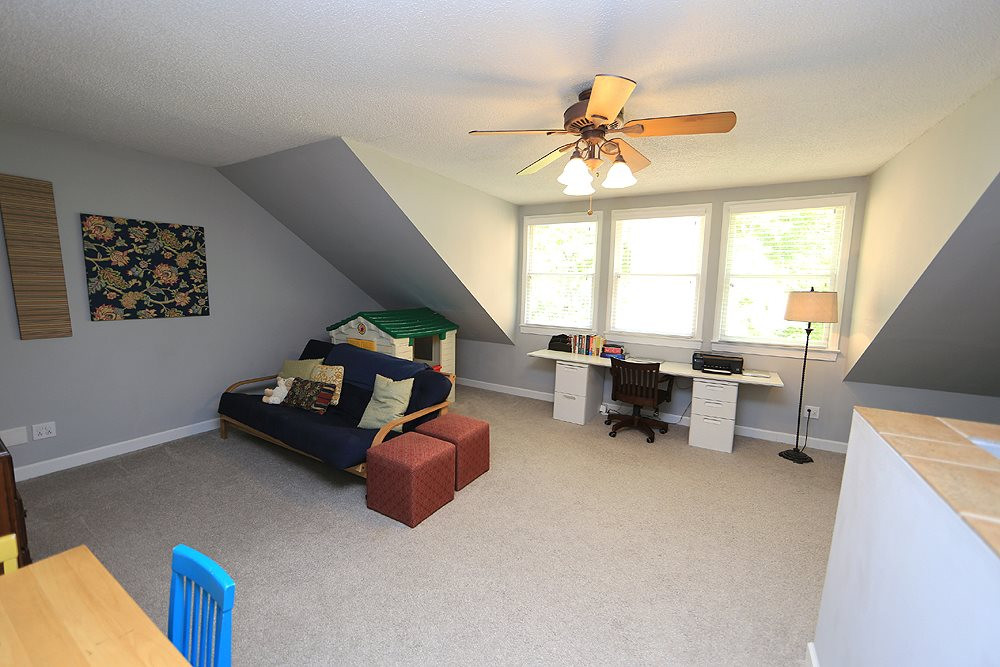 552 Weathergreen Drive Raleigh, NC 27615 - Photo 17 of 26 This level on the 3rd floor is not counted in the square footage, as it is not permitted. But these owners have enjoyed using it for play/work space. There is also storage area off this space. Bonus