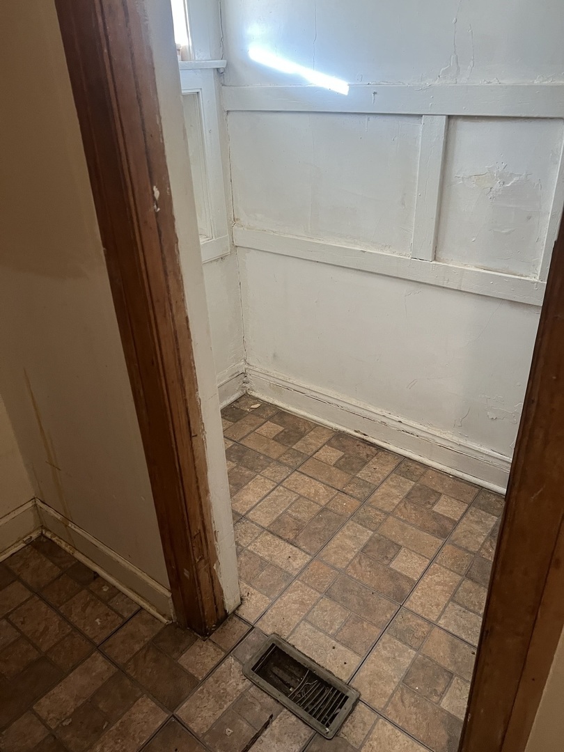 8010 South Evans Avenue, Unit 1 Chicago, IL 60619 - Photo 9 of 13 a view of an empty room