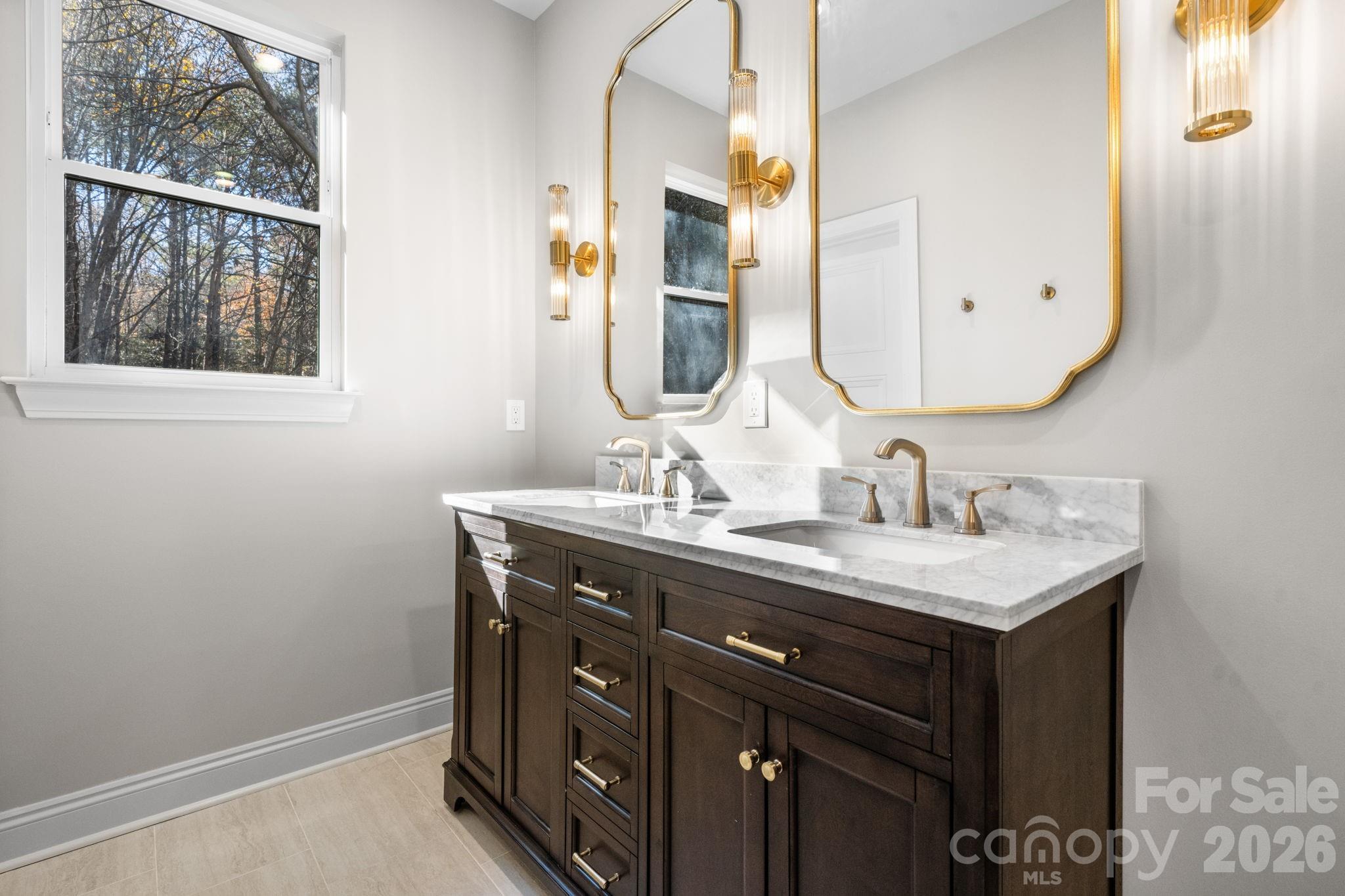 5163 Hurricane Hill Road Granite Falls, NC 28630 - Photo 19 of 40 a bathroom with a sink and a mirror