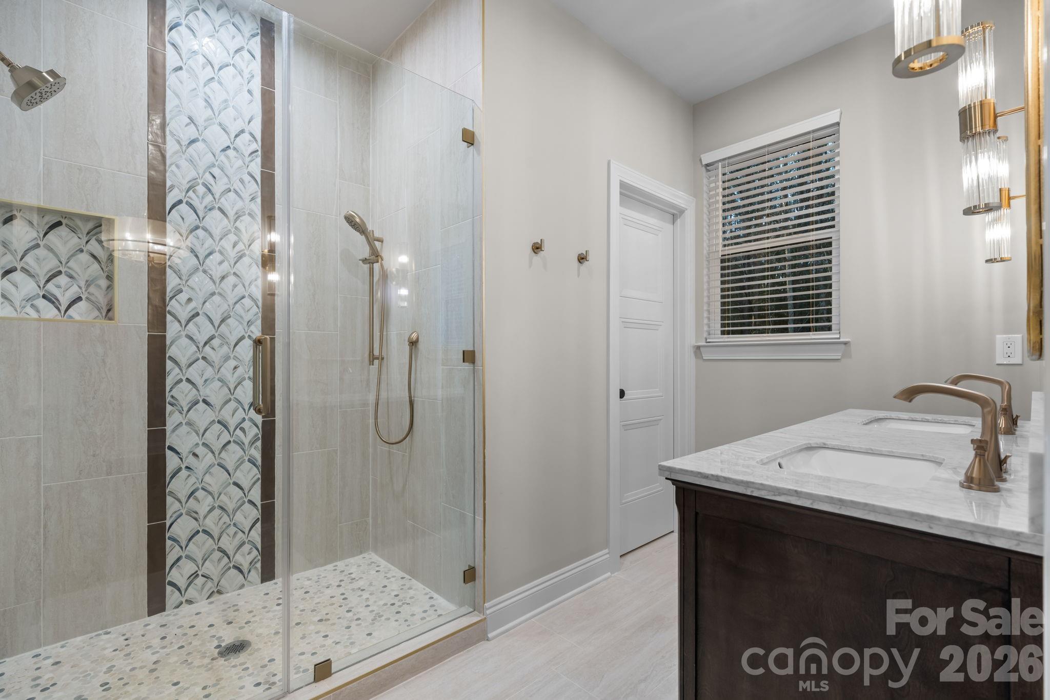 5163 Hurricane Hill Road Granite Falls, NC 28630 - Photo 20 of 40 a bathroom with a sink and a mirror