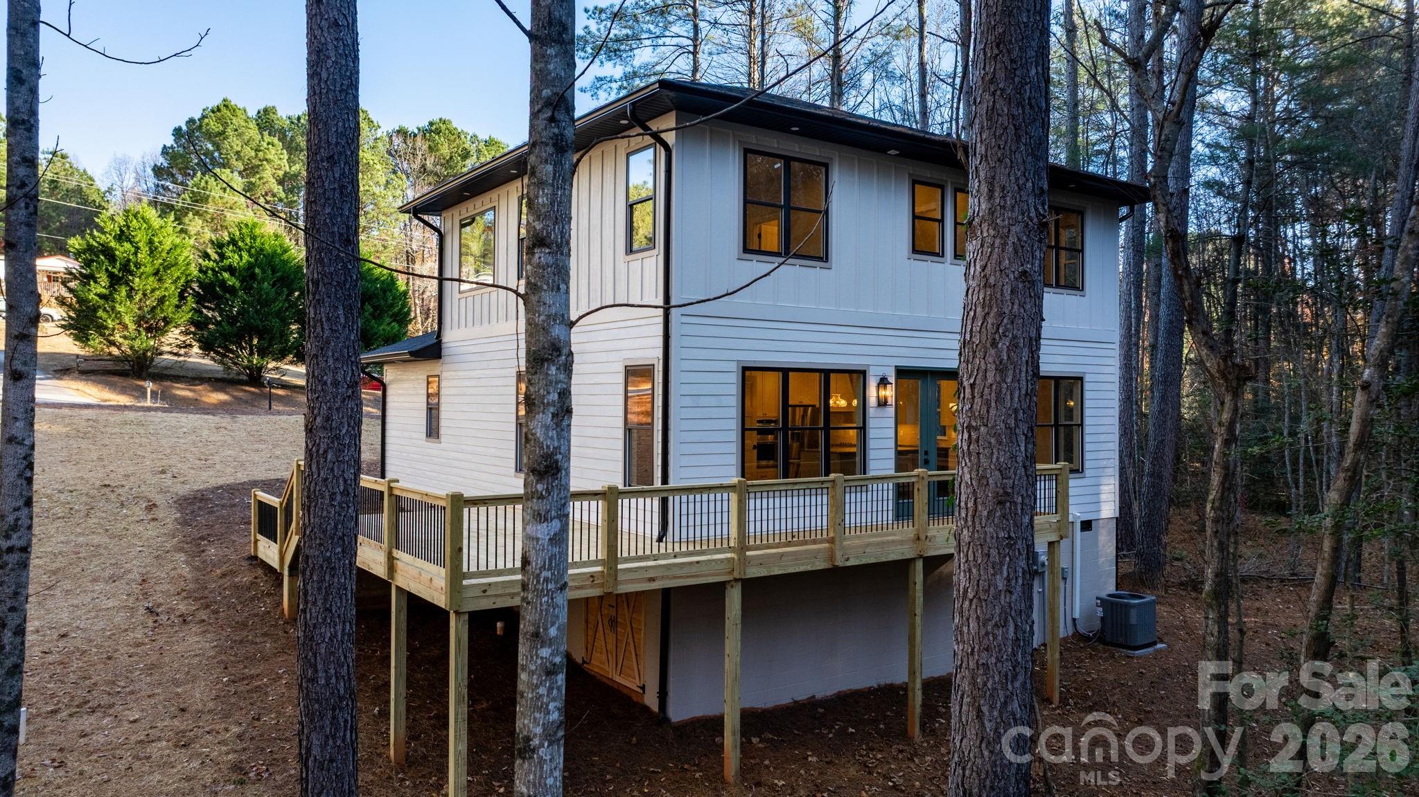 5163 Hurricane Hill Road Granite Falls, NC 28630 - Photo 33 of 40 a front view of a house with balcony