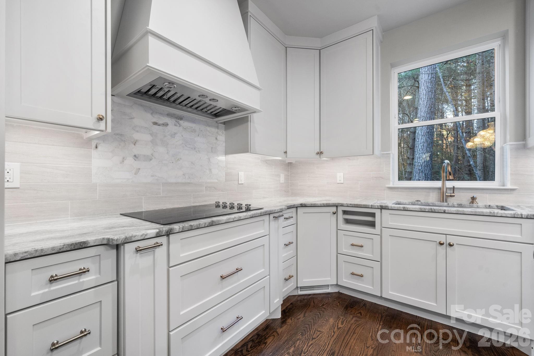 5163 Hurricane Hill Road Granite Falls, NC 28630 - Photo 8 of 40 a kitchen with granite countertop a sink and cabinets