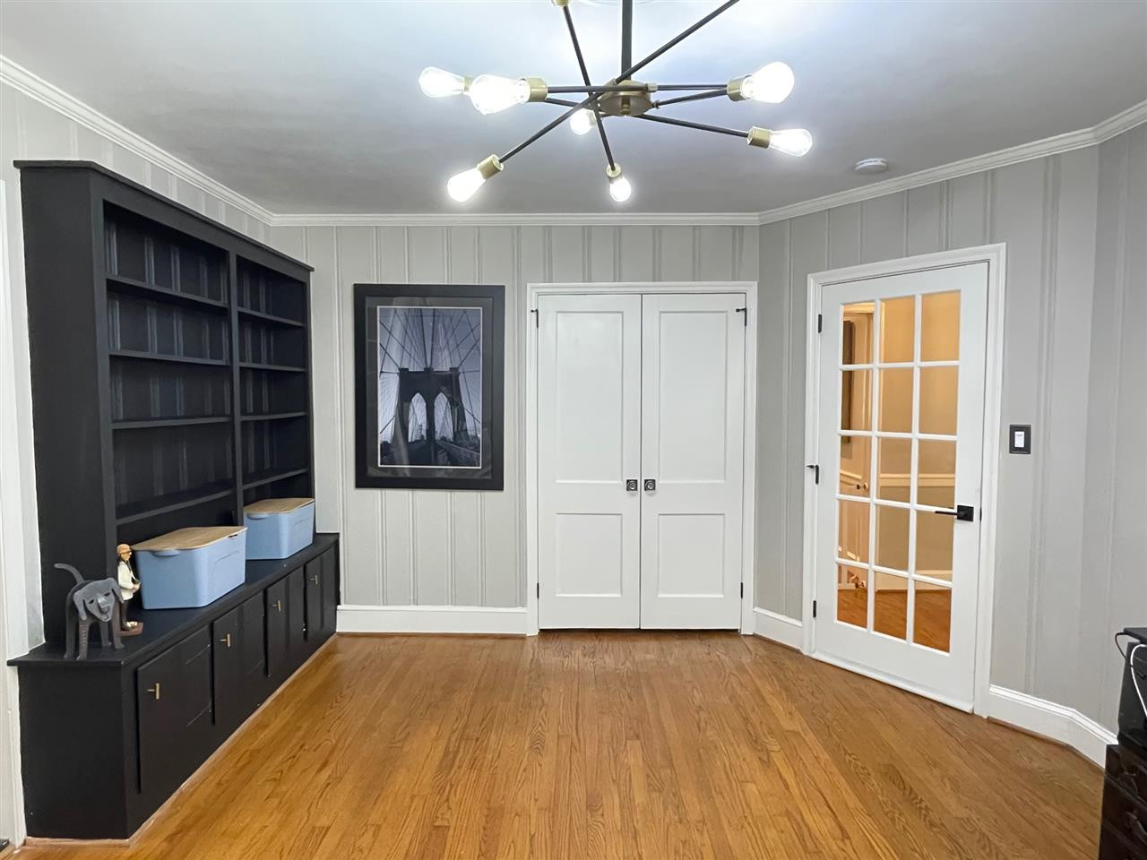 3613 Hathaway Road Durham, NC 27707 - Photo 14 of 24 a view of an empty room with a window and wooden floor