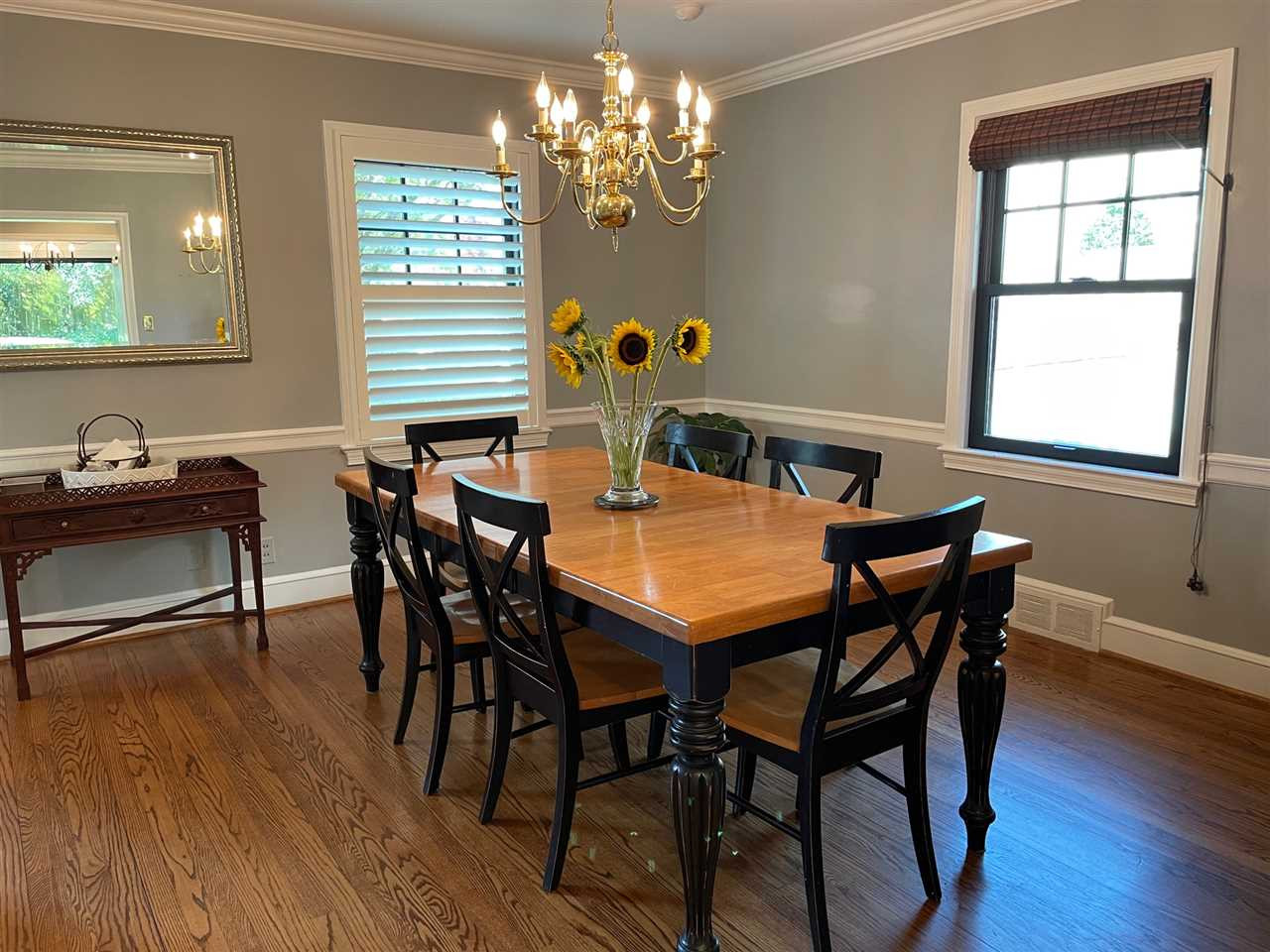 3613 Hathaway Road Durham, NC 27707 - Photo 17 of 24 a view of a dining room with furniture window and wooden floor