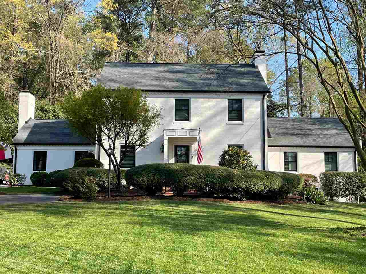 3613 Hathaway Road Durham, NC 27707 - Photo 2 of 24 a front view of a house with a yard and garage