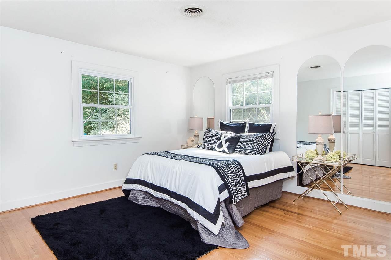 6412 Brandywine Road Raleigh, NC 27607 - Photo 15 of 25 a bedroom with a bed and window