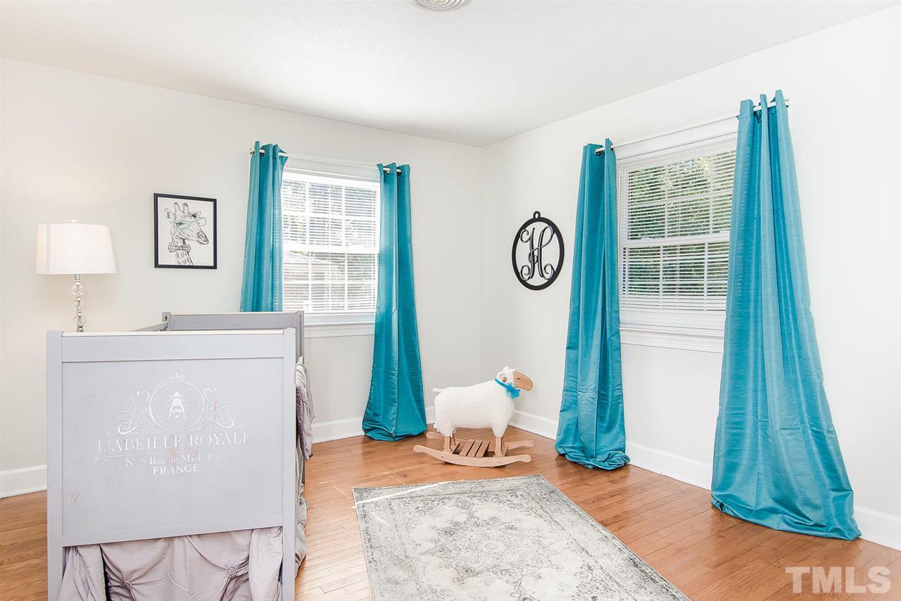 6412 Brandywine Road Raleigh, NC 27607 - Photo 17 of 25 a view of a storage & utility room with a window