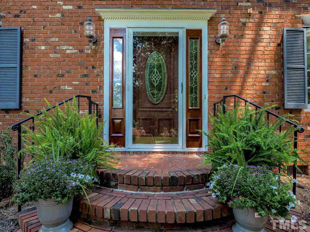 6412 Brandywine Road Raleigh, NC 27607 - Photo 3 of 25 a view of a entryway door front of house
