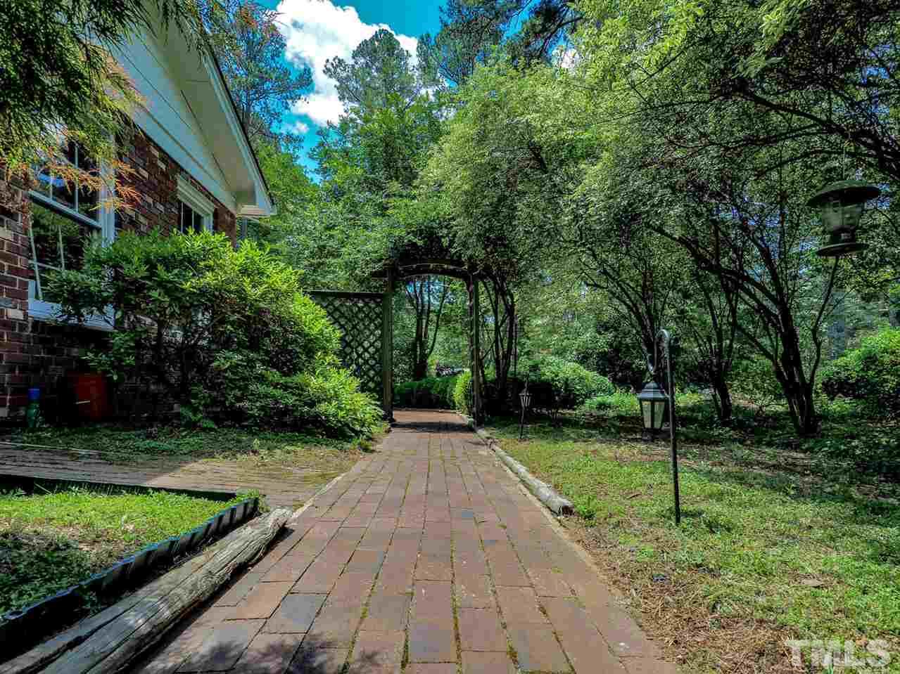 6412 Brandywine Road Raleigh, NC 27607 - Photo 22 of 25 a view of backyard with green space
