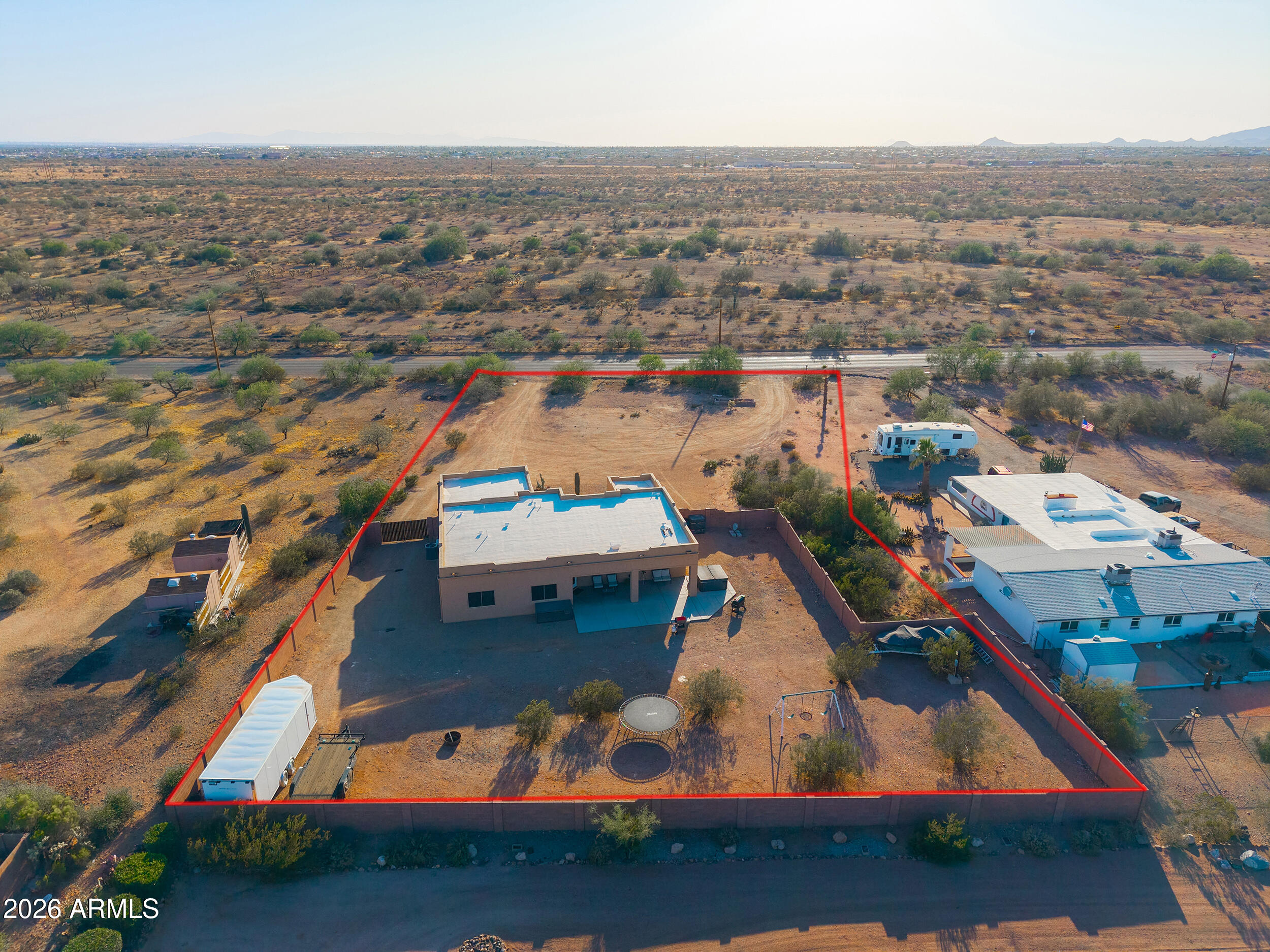 1487 South Mountain View Road Apache Junction, AZ 85119 - Photo 48 of 60 an aerial view of residential houses with outdoor space