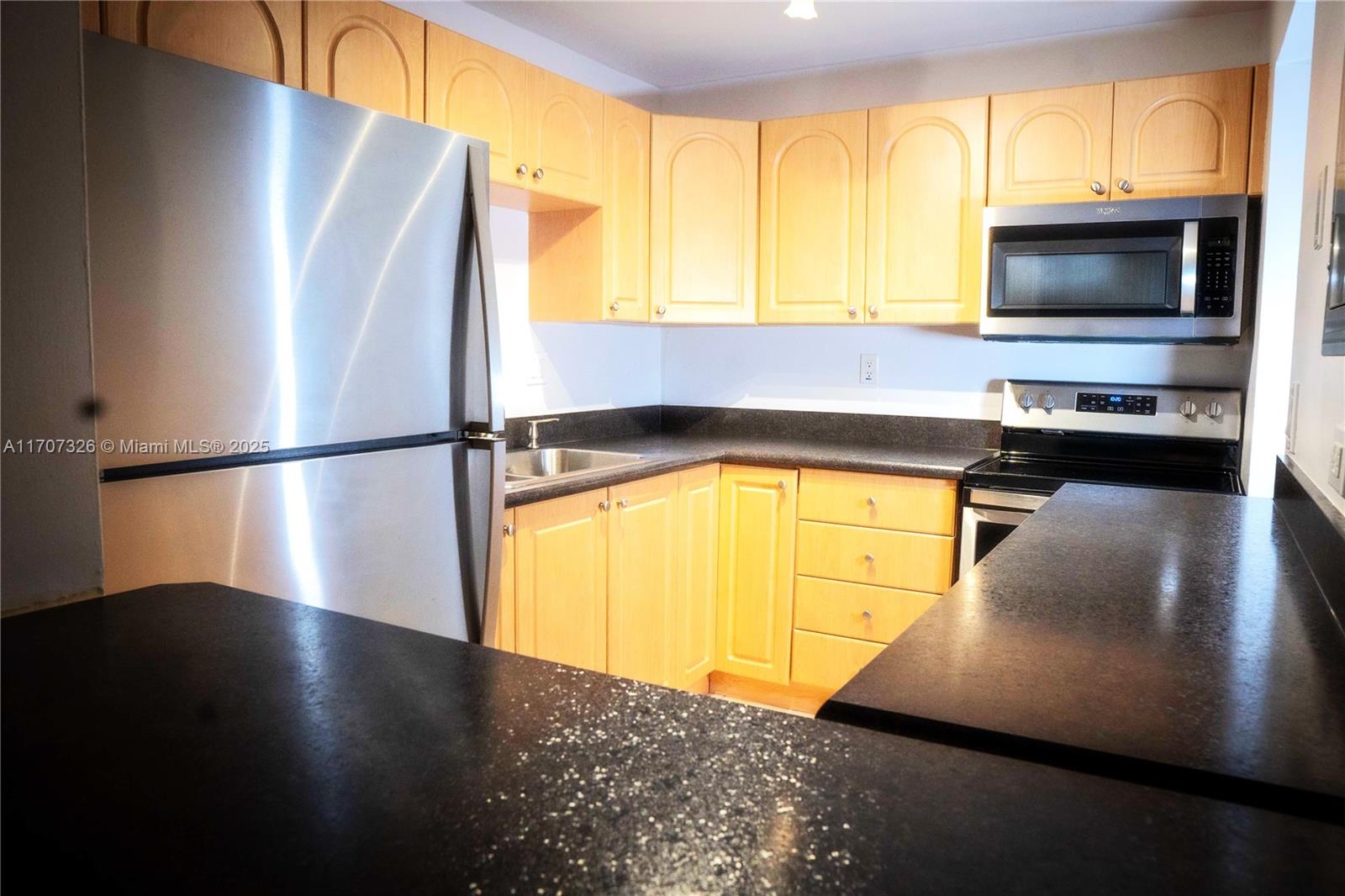 301 Racquet Club Road, Unit 307 Weston, FL 33326 - Photo 7 of 14
