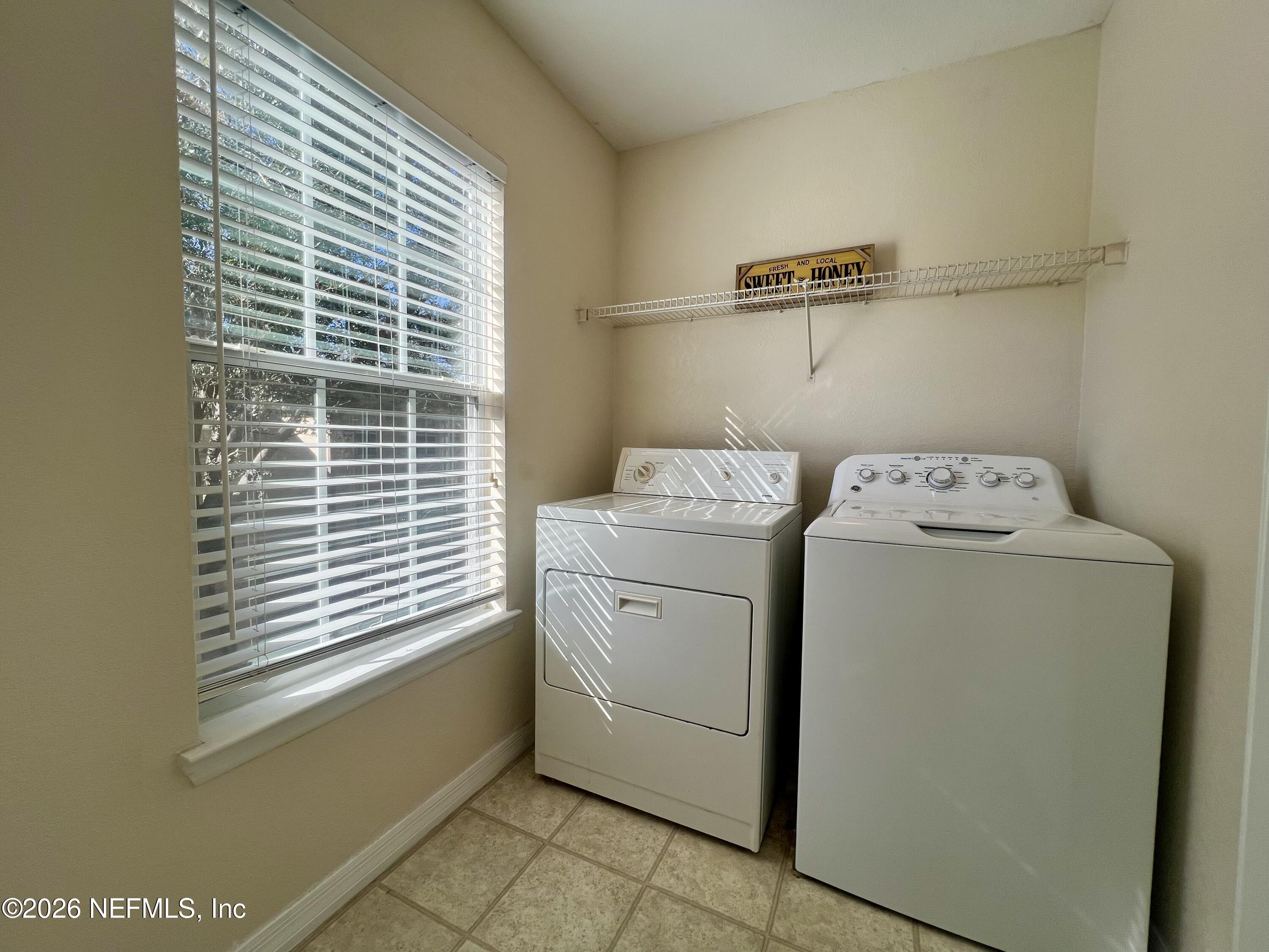 7800 Point Meadows Drive, Unit 938 Jacksonville, FL 32256 - Photo 9 of 34 Laundry Room