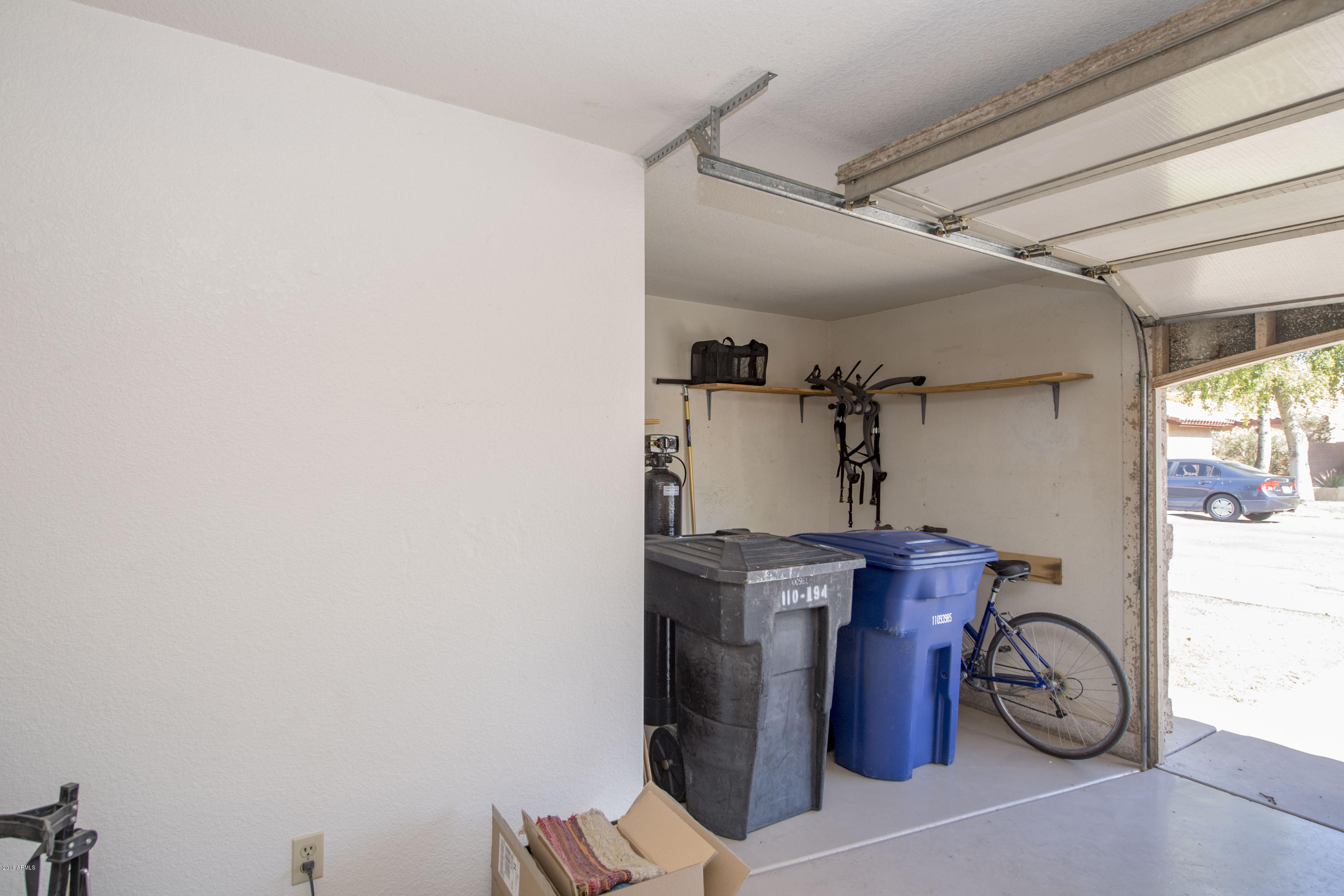 4823 West Del Rio Street Chandler, AZ 85226 - Photo 33 of 38 Garage with area for trash cans