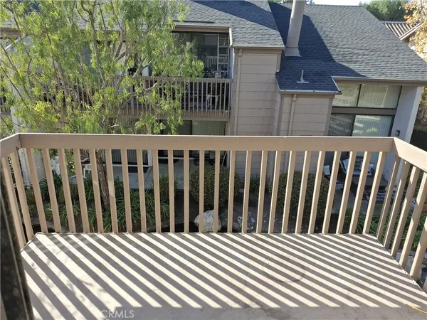 a view of a wooden fence