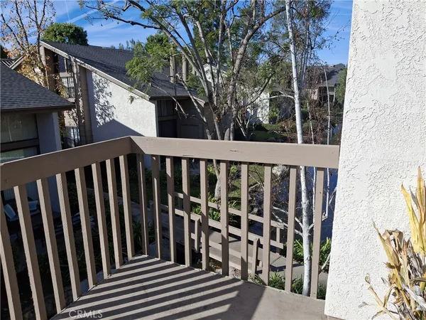 a view of a wooden fence