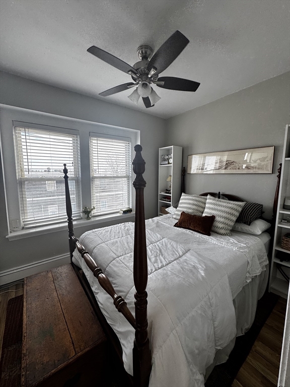 83 Chelsea Street, Unit 2 Boston, MA 02128 - Photo 5 of 7 a bedroom with a bed and window