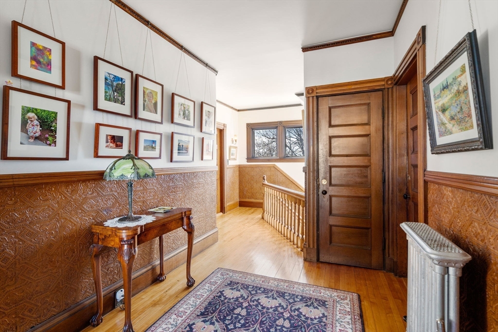 357 Crescent Street Waltham, MA 02453 - Photo 22 of 41 a living room with furniture and a window