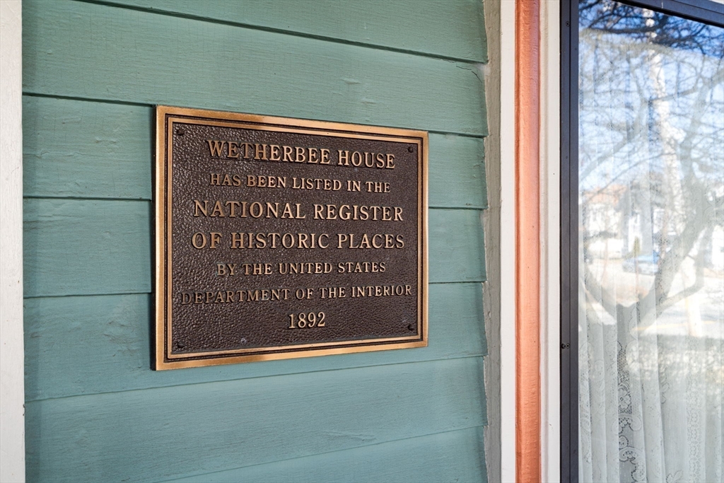 357 Crescent Street Waltham, MA 02453 - Photo 38 of 41 a view of a door and wooden floor