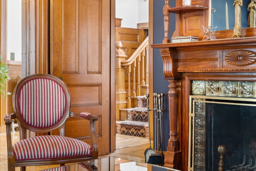 357 Crescent Street Waltham, MA 02453 - Photo 7 of 41 a view of a livingroom with furniture and staircase