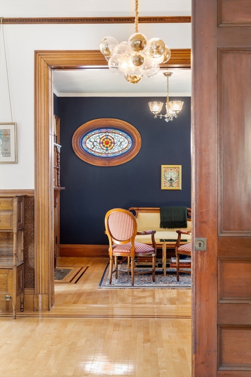 357 Crescent Street Waltham, MA 02453 - Photo 9 of 41 a view of a chairs in a room