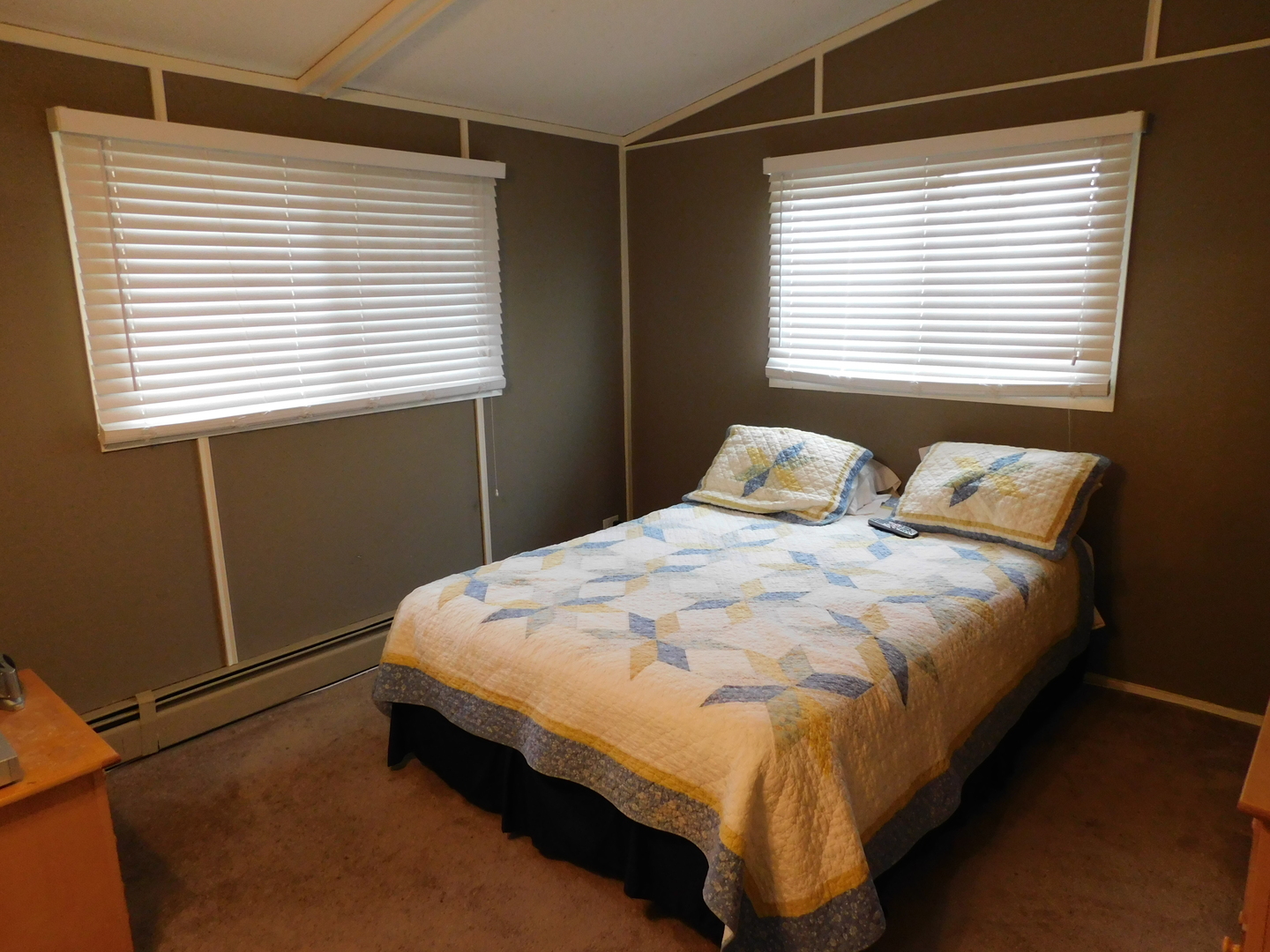 7737 Barnard Mill Road Richmond, IL 60071 - Photo 17 of 40 a bedroom with a bed next to a window