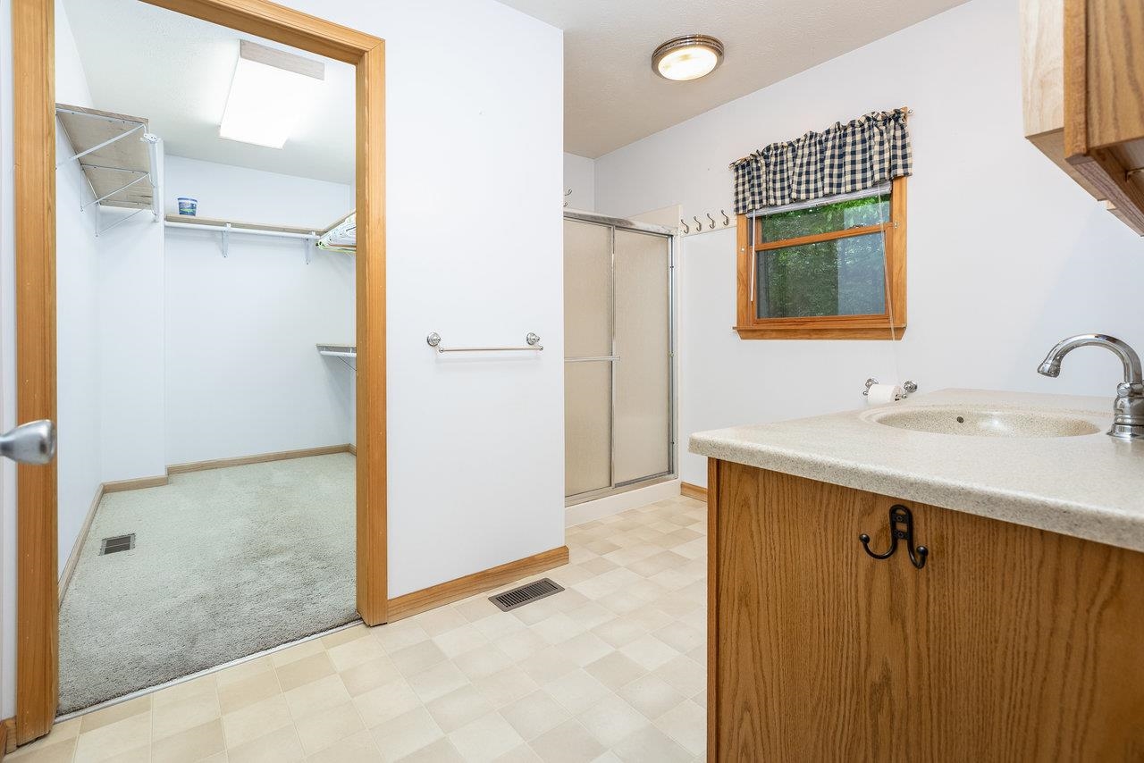 9385 Briery Branch Road Dayton, VA 22821 - Photo 24 of 75 a bathroom with a sink and a mirror