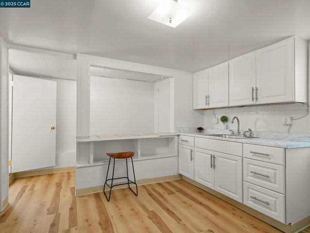 a room that has a bed and a window in it