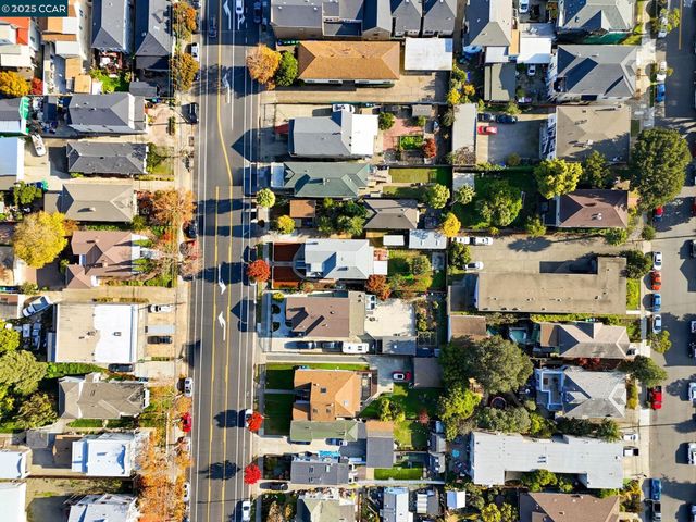 an aerial view of a city with lots of residential buildings