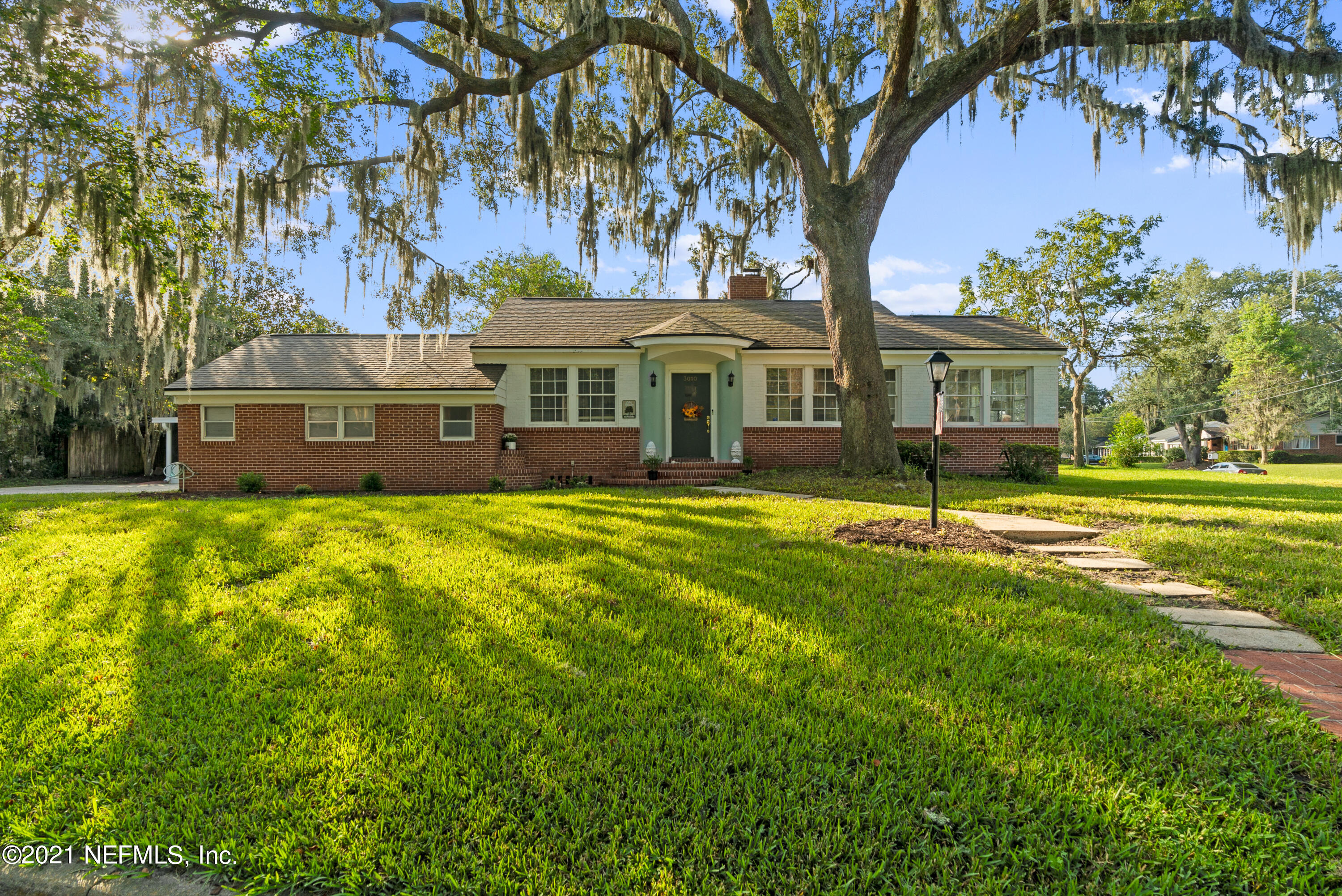 3010 Jolly Road Jacksonville, FL 32207 - Photo 1 of 41 a front view of a house with a yard