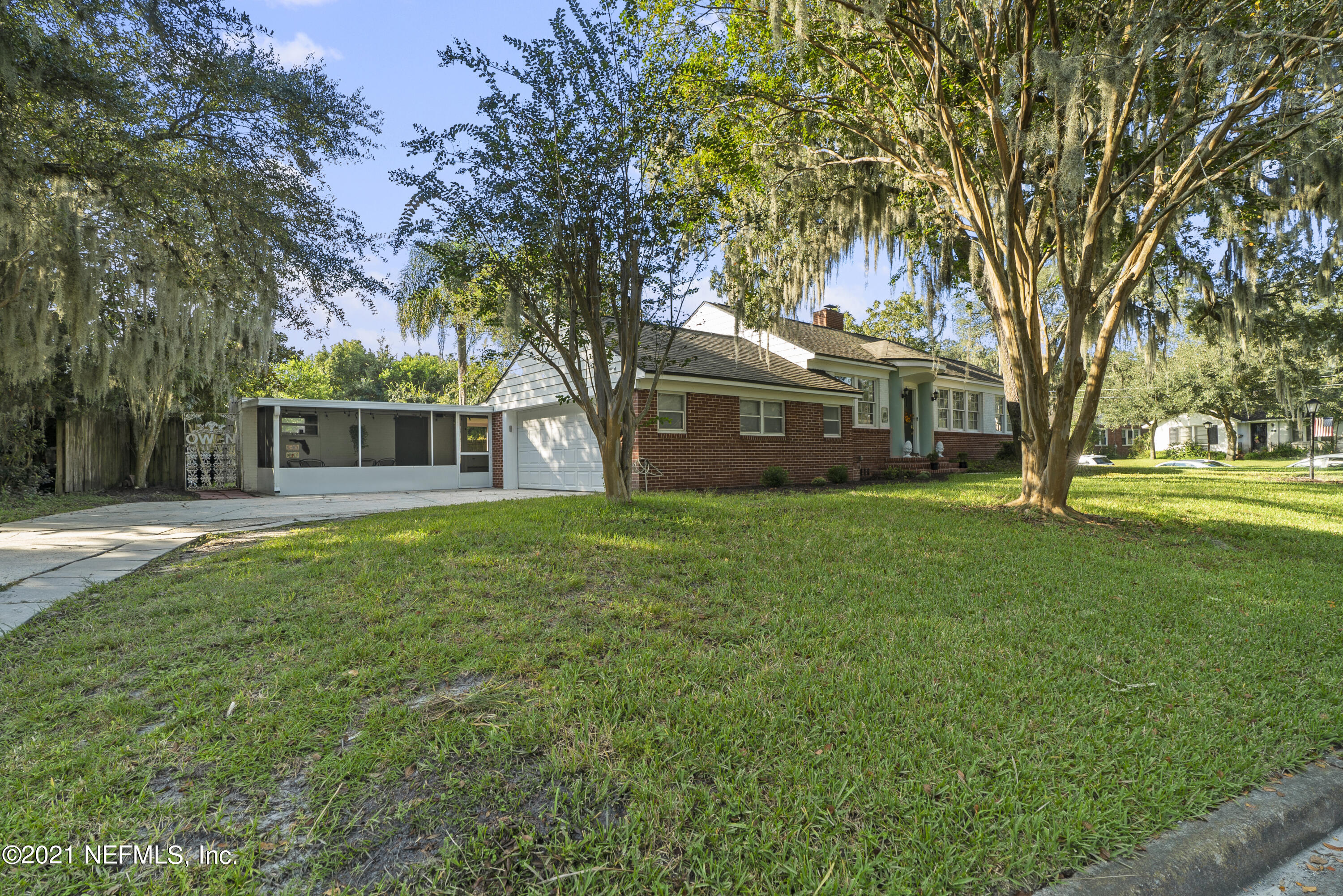 3010 Jolly Road Jacksonville, FL 32207 - Photo 40 of 41 a house view with swimming pool in front of it