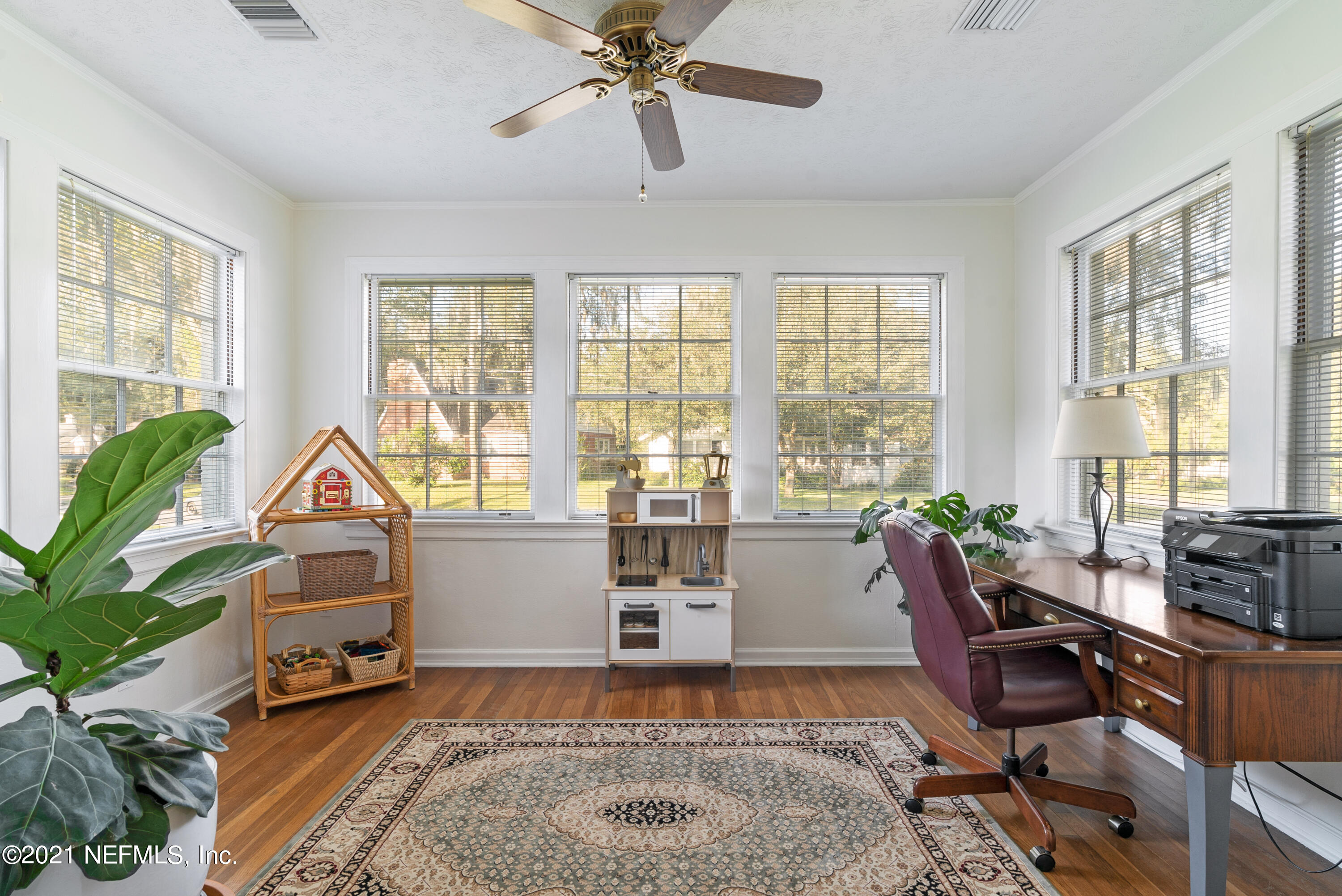 3010 Jolly Road Jacksonville, FL 32207 - Photo 10 of 41 a living room with furniture and a large window
