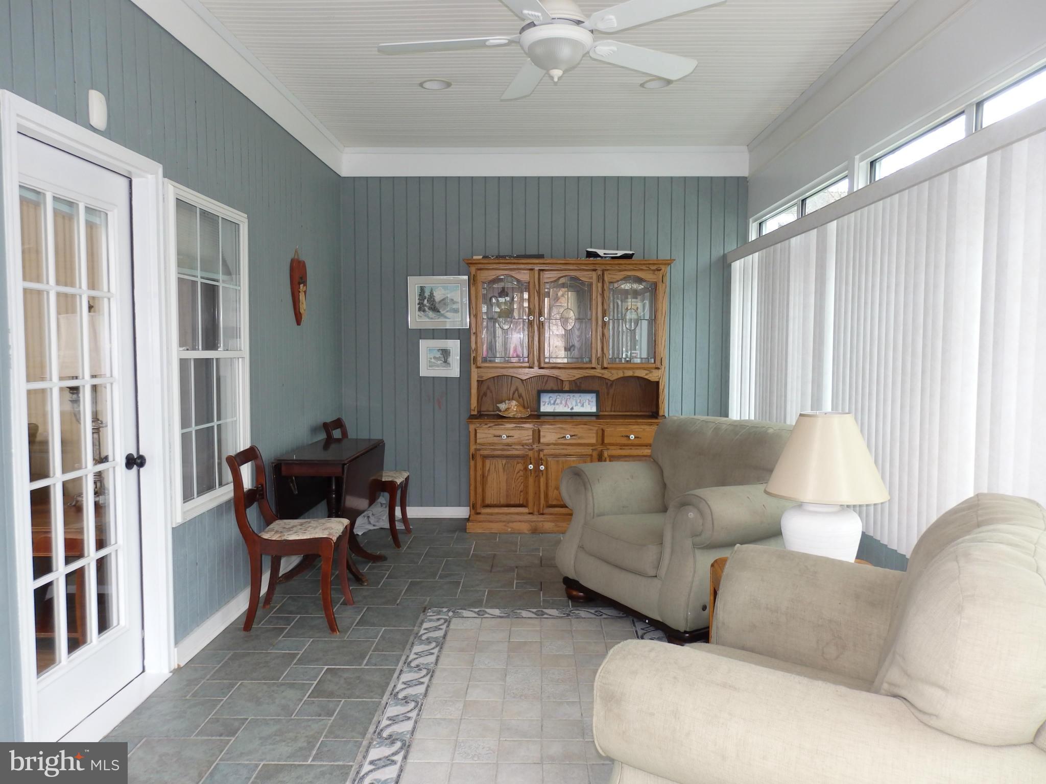 2543 Bear Den Road Frederick, MD 21701 - Photo 11 of 30 a living room with furniture and a window