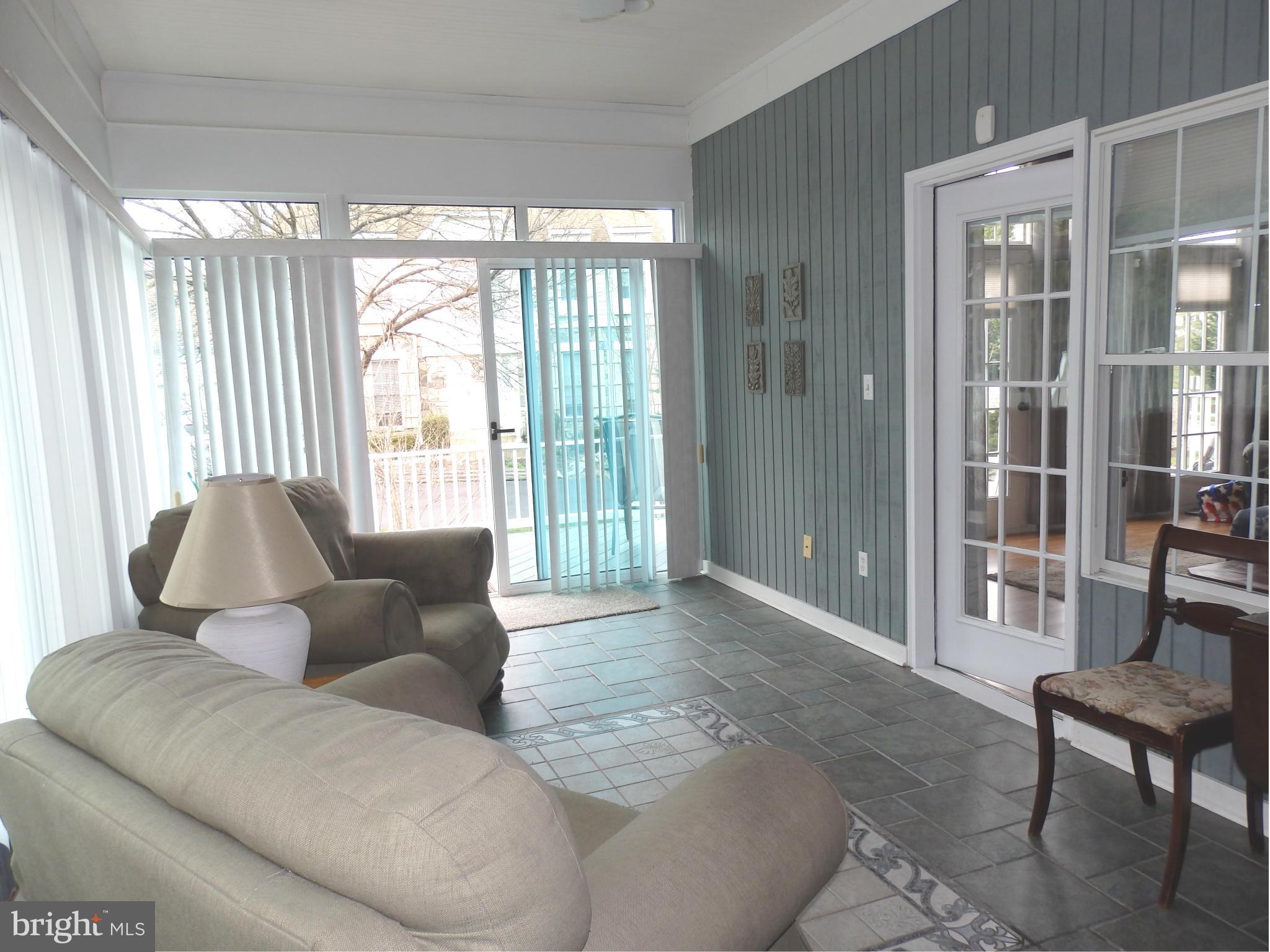 2543 Bear Den Road Frederick, MD 21701 - Photo 13 of 30 a living room with furniture and a large window