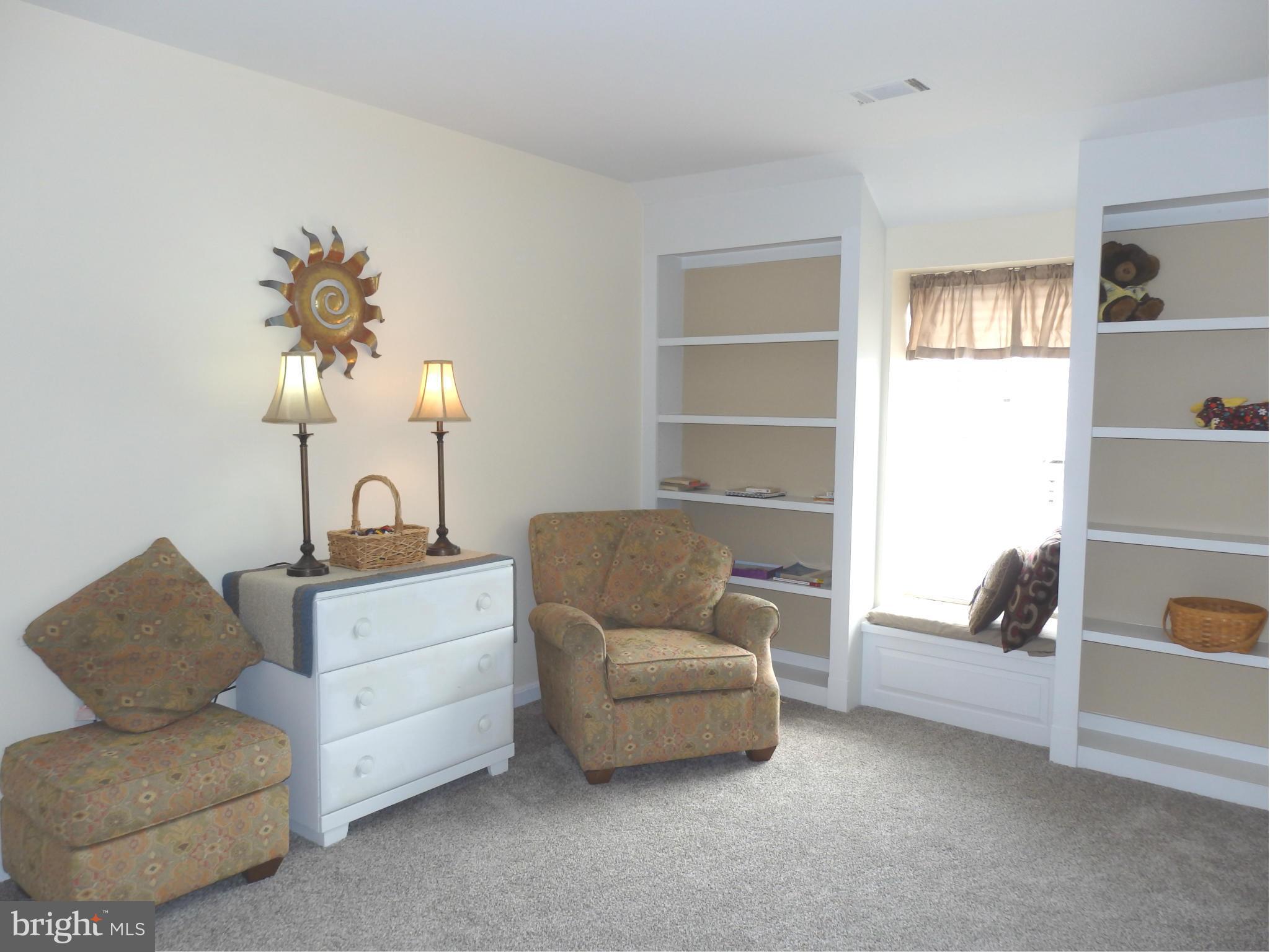 2543 Bear Den Road Frederick, MD 21701 - Photo 23 of 30 a living room with furniture and a window