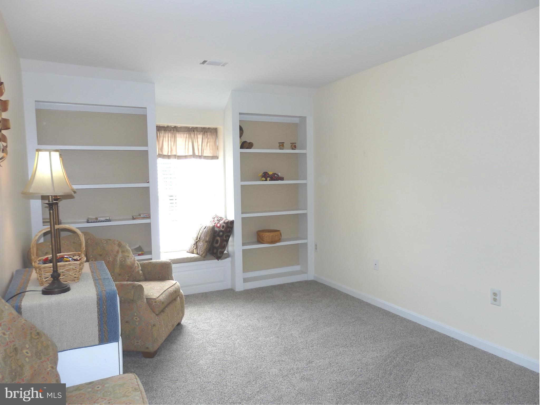 2543 Bear Den Road Frederick, MD 21701 - Photo 24 of 30 a living room with furniture and a window