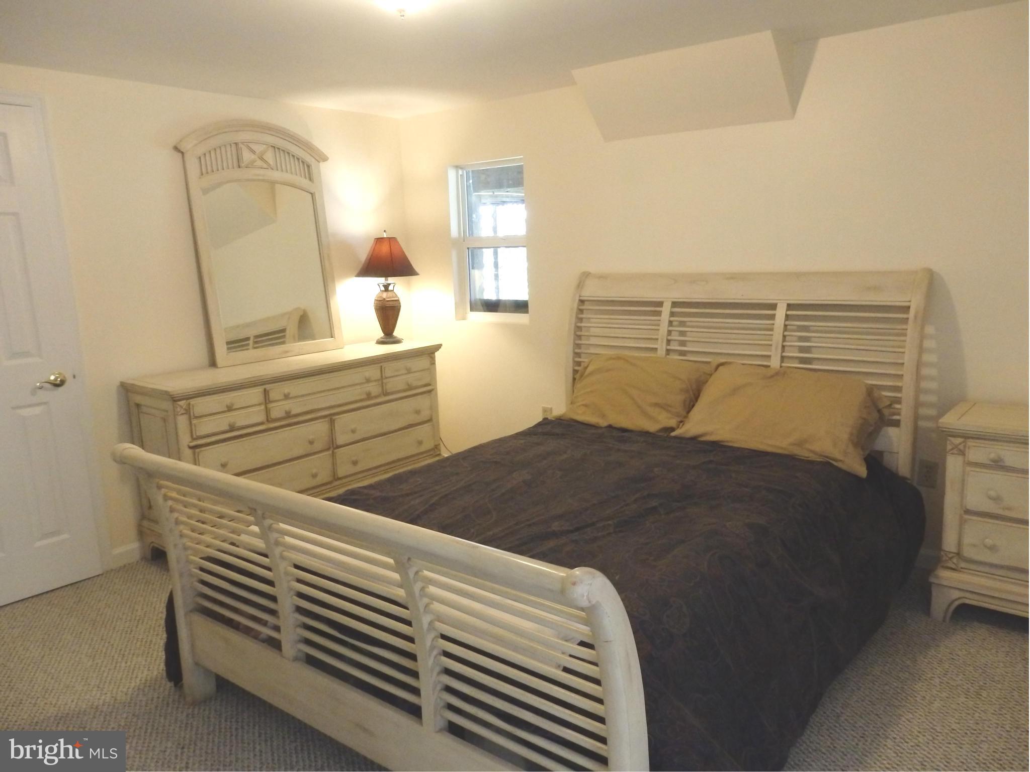 2543 Bear Den Road Frederick, MD 21701 - Photo 28 of 30 a bedroom with a bed and a dresser