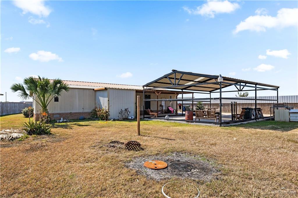 48 Gladiola Street Alamo, TX 78516 - Photo 3 of 14 a view of a house with swimming pool and sitting area