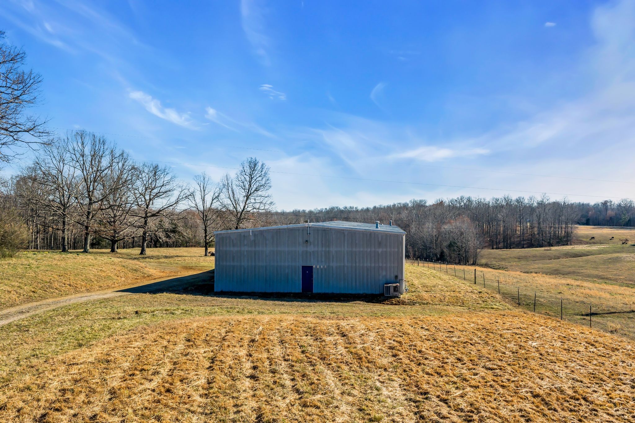 2340 Ridge Road McEwen, TN 37101 - Photo 18 of 72 a view of a dry yard with wooden fence