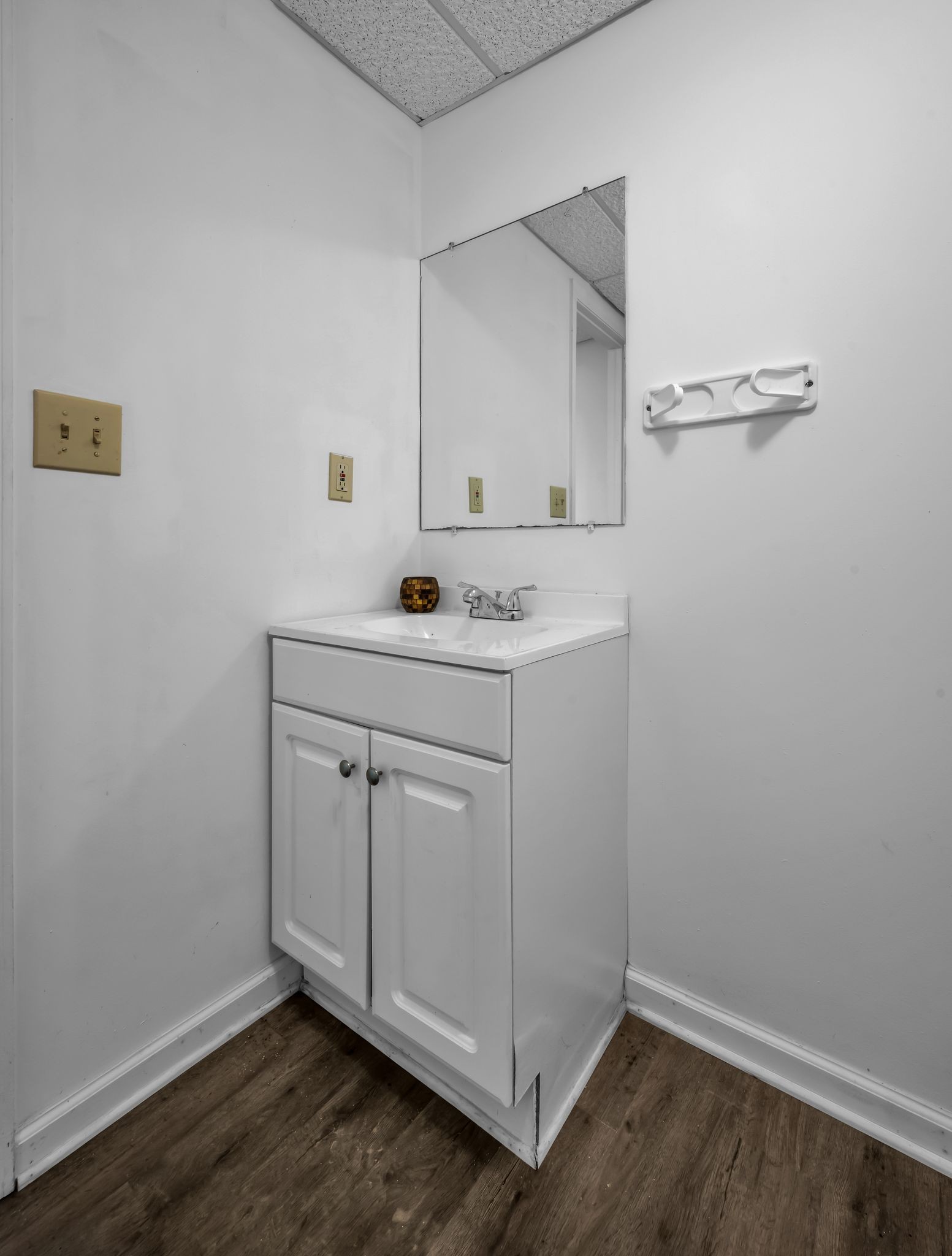 2340 Ridge Road McEwen, TN 37101 - Photo 66 of 72 a bathroom with a sink a vanity and a mirror